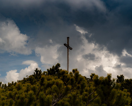 Thy will be done - Cross on top of a mountain in Bavaria, Germany