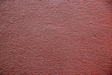 Red painted rough brick stone texture