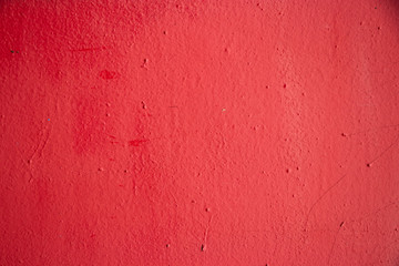 Red painted rough concrete texture