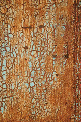 Fototapeta premium Rusted metal with cracks and peeling paint