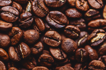 Coffee grains. Background of roasted coffee beans brown. layout. Flat lay.