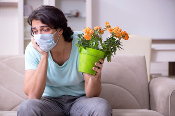Young man suffering from allergy 