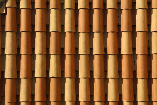 Red tile roof. Roof tiles on the roof