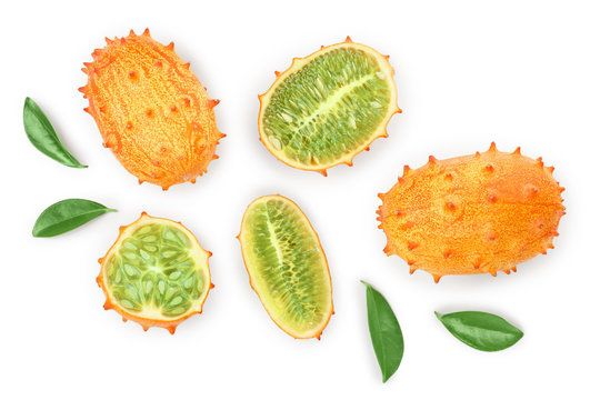 Kiwano or horned melon with leaves isolated on white background, Top view. Flat lay.
