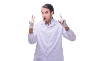 Young handsome doctor with syringe isolated on white 