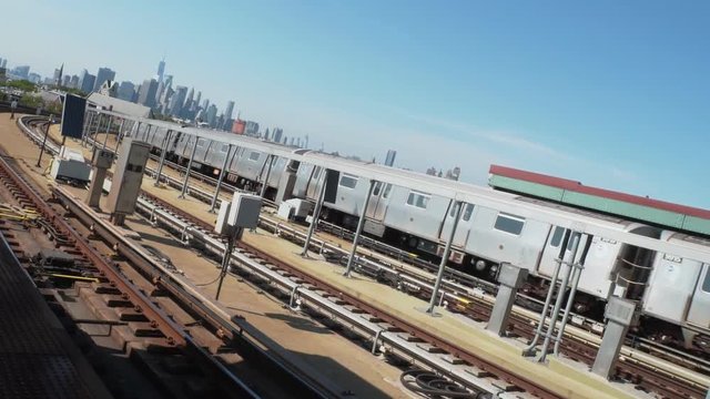 moving subway trains on the background of Manhattan