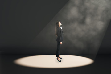 Fototapeta premium Businesswoman in spot light