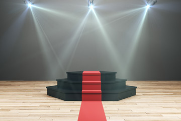 Illuminated podium with red carpet