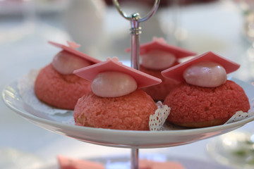 Tasty cakes on plate, close up
