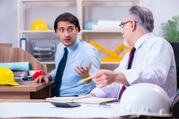 Two architects working on the project 