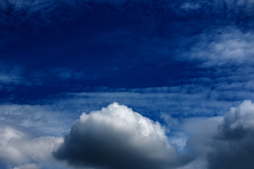Naklejka na ściany i meble white clouds in bright blue sky