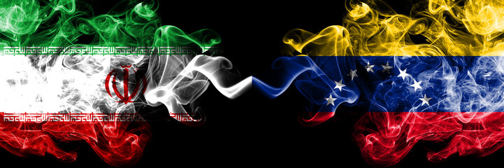 Iran vs Venezuela, Venezuelan smoky mystic states flags placed side by side. Thick colored silky smokes flag combination of Iranian and Venezuela, Venezuelan