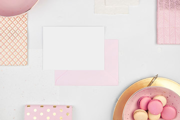 minimal background flatlay with copy space pink macarons
