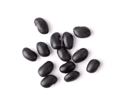 black beans isolated on white background. top view