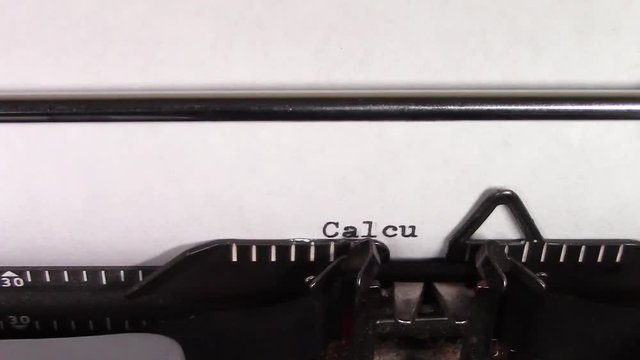 A close up video of the words "Calculus 101 " being typed on white paper in an old manual typewriter. Shot in macro.