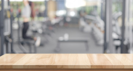 Empty wood table space platform and fitness gym background