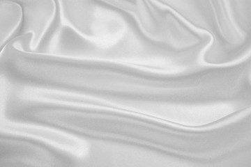 Fototapeta premium The texture of the satin fabric of white color for the background