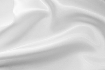 The texture of the satin fabric of white color for the background
