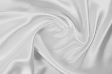 Obraz premium The texture of the satin fabric of white color for the background