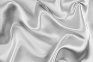 Fototapeta premium The texture of the satin fabric of white color for the background