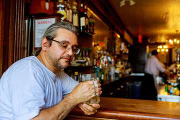 Men drinking beer of handsome men drinking beer and looking away