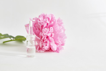 Obraz premium Improving cosmetic procedures. Organic skin care products and flower.