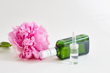 Aromatic body oils, flowers. place for text.
