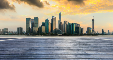 Shanghai skyline and modern city skyscrapers with wooden board square,China