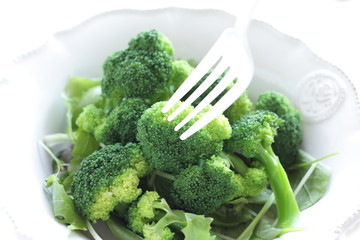 boiled broccoli on white background
