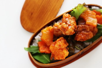 Chinese food, sweet and sour pork on rice for lunch box image