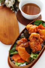 Chinese food, sweet and sour pork on rice for lunch box image