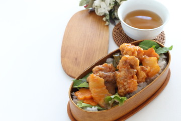Chinese food, sweet and sour pork on rice for lunch box image