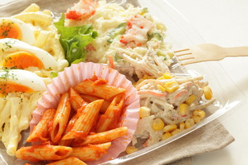 pasta and potato salad for party food image