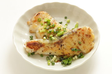 Chinese food, pan fried cod fish and scallion
