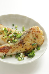 Chinese food, pan fried cod fish and scallion