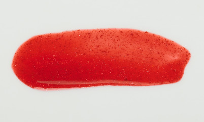 Deep red sparkle paint stroke