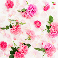 Floral pattern of pink roses flowers on white background. Flat lay, Top view.