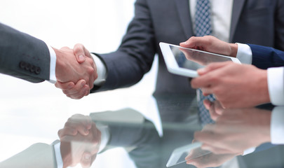 close up.handshake of new business partners