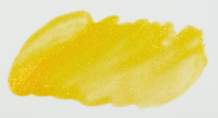 Fototapeta na wymiar Sparkle yellow paint stain isolated