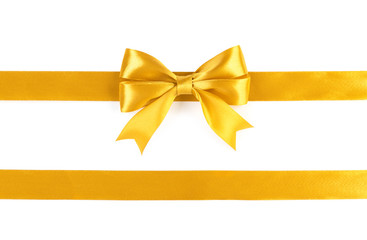 Gold ribbons with bow isolated on white background