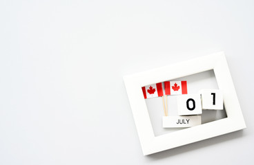 July 01 Wooden calendar and Canada Flag Concept Canada national day with space for your text