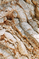  Stone walls and rocky shore. Rocks in the Bay of Budva, Montenegro.
