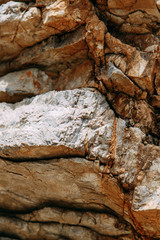  Stone walls and rocky shore. Rocks in the Bay of Budva, Montenegro.