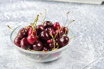 Cherries in a glass bowl. Red cherry. Fresh cherries. healthy food and nutrition