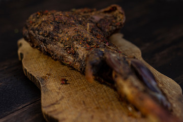 Baked goat leg with spices