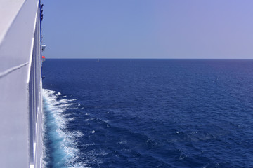View to the blue  sea from the big ship neart port. Peaceful serene landscape.