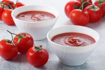 Two plates with gazpacho - traditional Spanish tomato soup