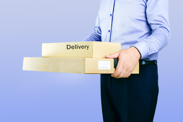 Delivery man with parcel or box. Courier service concept.
