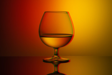 Art glitch effect, glass glass with water on a bright multi-colored background, minimalism