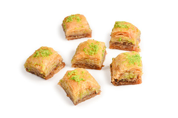 Pistachio baklava on a white background. Dessert.